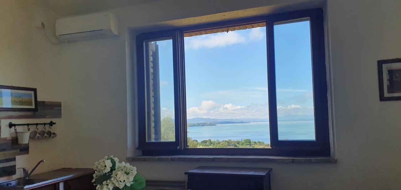 Poloturisticoumbria Rustico Con Piscina Vista Lago 特拉西梅诺湖畔帕西尼亚诺 外观 照片